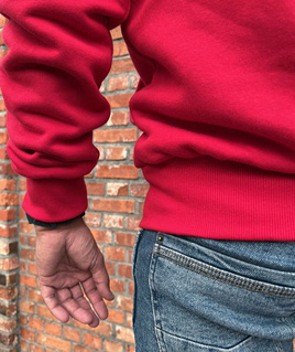 Red sweatshirt of the Polish national team with the emblem and the inscription Poland